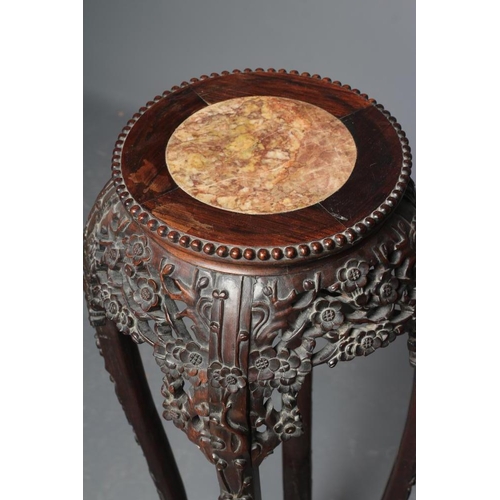 641 - A CHINESE HARDWOOD JARDINIERE STAND, c.1900, the beaded edge circular top with veined red marble ins... 