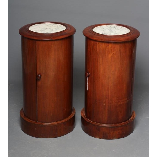 649 - A PAIR OF VICTORIAN MAHOGANY BEDSIDE CABINETS of cylindrical form with inset veined white marble top... 