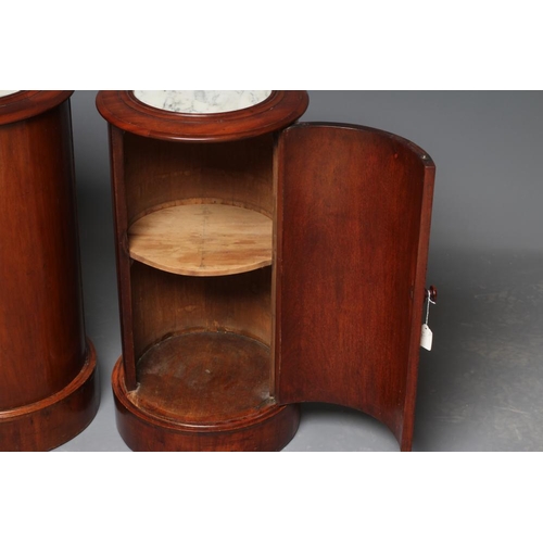 649 - A PAIR OF VICTORIAN MAHOGANY BEDSIDE CABINETS of cylindrical form with inset veined white marble top... 