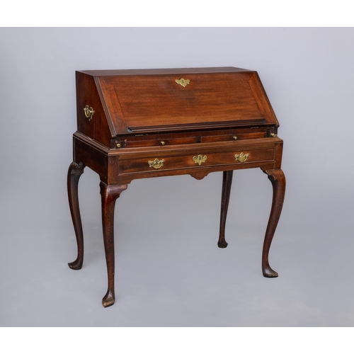 657 - A GEORGIAN MAHOGANY BUREAU ON STAND, third quarter 18th century, the fall front with book stay, open... 