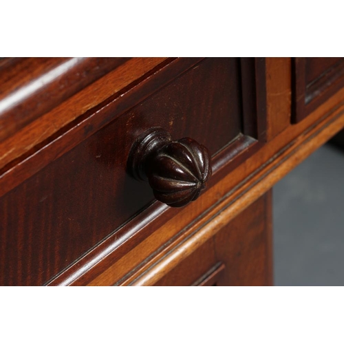 669 - A VICTORIAN MAHOGANY PEDESTAL DESK, the moulded edged rounded oblong top inset with tooled green lea... 