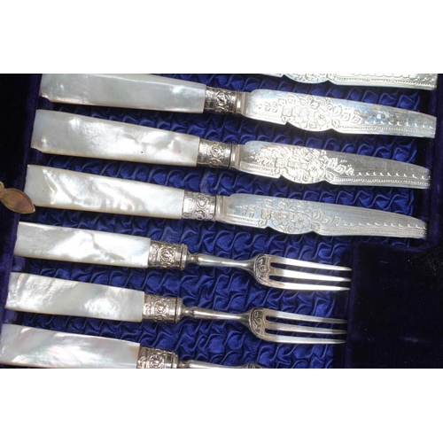 134 - A SET OF TWELVE EDWARDIAN FRUIT KNIVES AND FORKS, maker R & W Sorley, Sheffield 1908, with foliate e... 