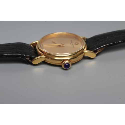 160 - A LADY'S 18CT GOLD BAUME & MERCIER WRISTWATCH with plain dark champagne dial, seventeen jewel moveme... 