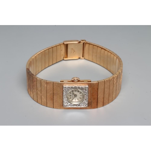 161 - A LADY'S 18CT GOLD AND DIAMOND OMEGA WRISTWATCH, the silvered dial with applied white metal batons, ... 