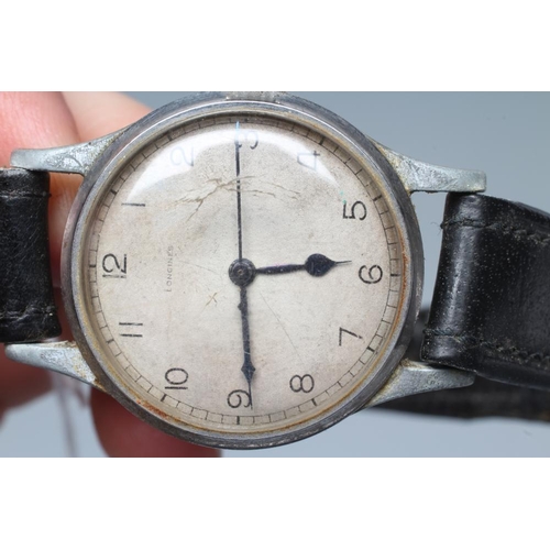 165 - A BRITISH MILITARY R.A.F. PILOT'S LONGINES WRISTWATCH, the silvered dial with black Arabic numerals,... 