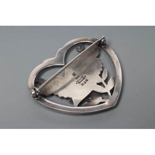 186 - A GEORG JENSEN SILVER HEART SHAPED BROOCH designed by Arno Malinowski with a dove and olive branch, ... 