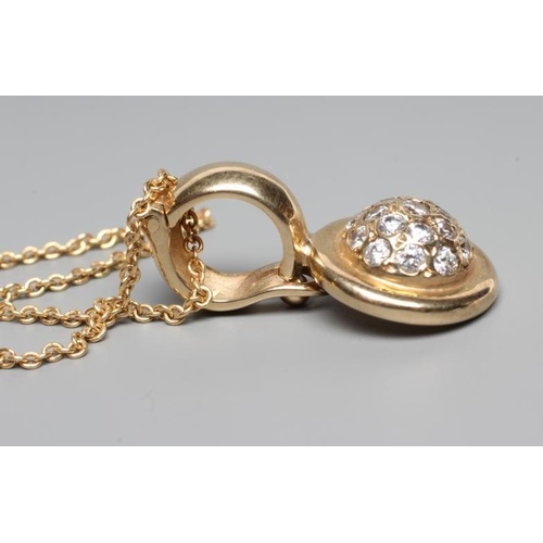 209 - A DIAMOND PENDANT, the central dome pave set with an eighteen stone small cluster within a yellow ri... 