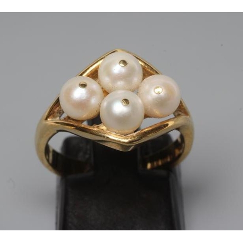 224 - A PEARL DRESS RING, the four cultured pearls 