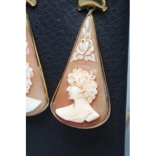 226 - A PAIR OF SHELL CAMEO DROP EARRINGS, the rounded triangular panels each carved with a lady's head po... 