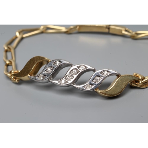 227 - A BRACELET, the three central white metal S shaped panels each pave set with small round brilliant c... 