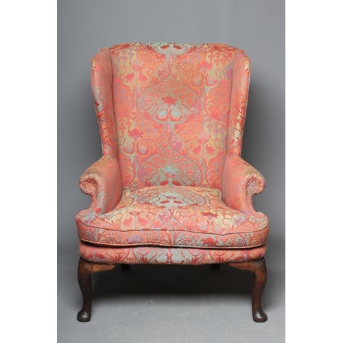 663 - A GEORGIAN OAK FRAMED WING ARMCHAIR, mid 18th century, upholstered in a rust and pale green weave, w... 