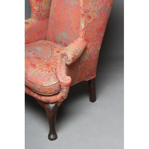 663 - A GEORGIAN OAK FRAMED WING ARMCHAIR, mid 18th century, upholstered in a rust and pale green weave, w... 