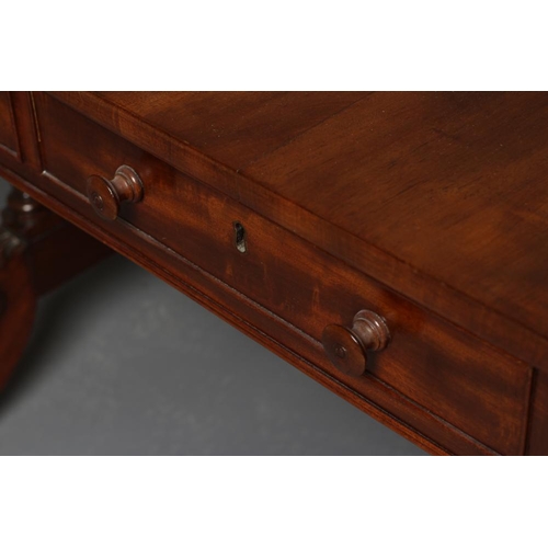 658 - A REGENCY MAHOGANY SOFA TABLE, early 19th century, the rounded oblong top over frieze with two drawe... 