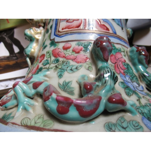 2 - A PAIR OF CANTONESE PORCELAIN FAMILLE ROSE ROULEAU ALCOVE VASES with shi-shi handles and salamanders... 