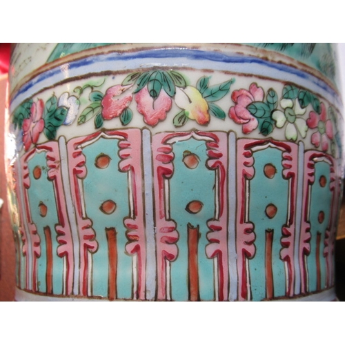 2 - A PAIR OF CANTONESE PORCELAIN FAMILLE ROSE ROULEAU ALCOVE VASES with shi-shi handles and salamanders... 