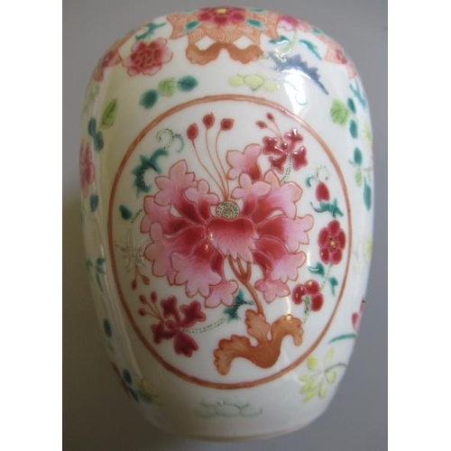 6 - A CHINESE PORCELAIN FAMILLE ROSE JAR of ovoid form painted with roundels of peonies on a scattered f... 