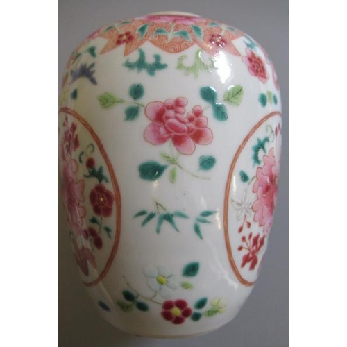 6 - A CHINESE PORCELAIN FAMILLE ROSE JAR of ovoid form painted with roundels of peonies on a scattered f... 