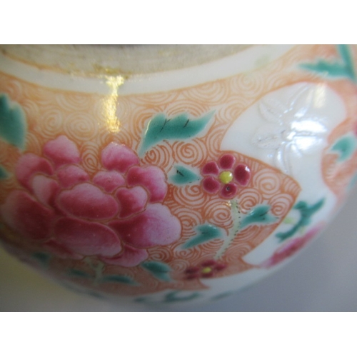 6 - A CHINESE PORCELAIN FAMILLE ROSE JAR of ovoid form painted with roundels of peonies on a scattered f... 