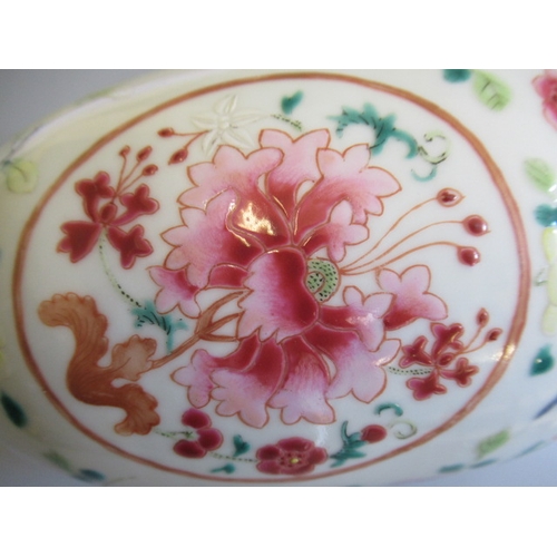 6 - A CHINESE PORCELAIN FAMILLE ROSE JAR of ovoid form painted with roundels of peonies on a scattered f... 