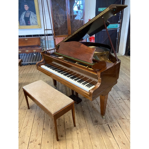 646 - A BECHSTEIN BABY GRAND PIANO, in mahogany case with arched music stand, raised on square tapering le... 