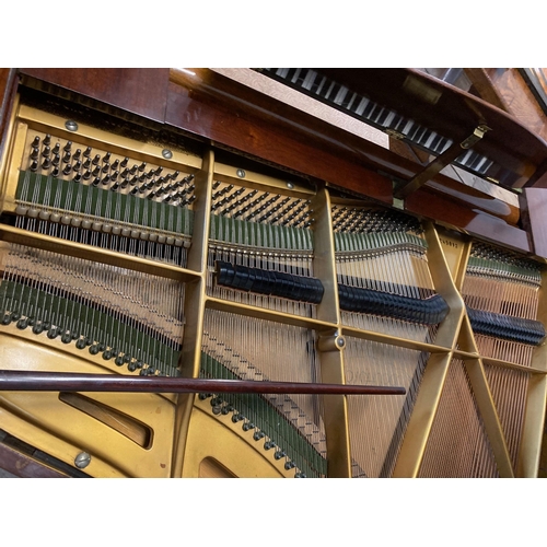 646 - A BECHSTEIN BABY GRAND PIANO, in mahogany case with arched music stand, raised on square tapering le... 