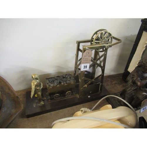 39 - BRASS MODEL OF A MINER AND PIT WHEEL