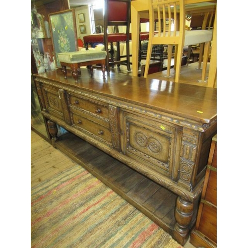 1025 - TITCHMARSH AND GOODWIN CARVED OAK SIDEBOARD