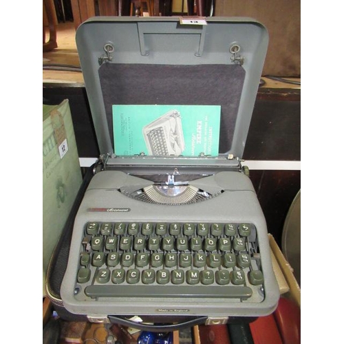 13 - OLYMPIA AND EMPIRE TYPEWRITERS