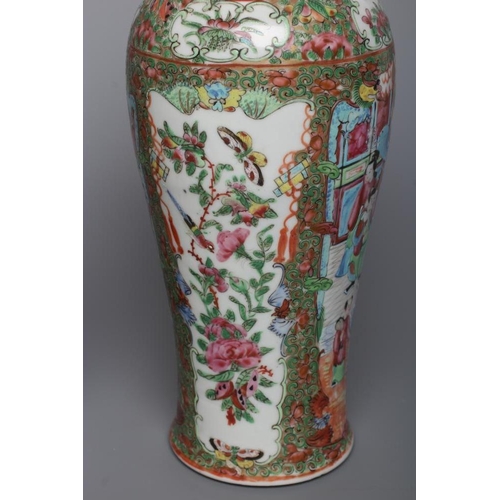 2 - THREE CANTONESE PORCELAIN FAMILLE ROSE VASES AND COVERS of inverted baluster form, all painted with ... 