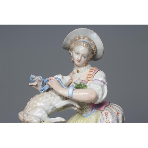 26 - A MEISSEN PORCELAIN FIGURE, late 19th century, modelled as a shepherdess wearing a blue hat, lace ch... 