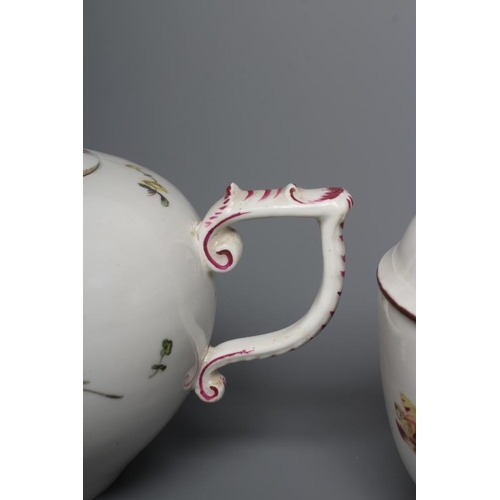 27 - A HOCHST PORCELAIN TEAPOT AND COVER, c.1760, of globular form with scroll handle and mask spout, pai... 