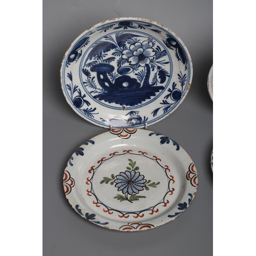 35 - AN ENGLISH DELFT PLATE, London c.1740, painted in green, red, yellow and blue with a seated chinoise... 