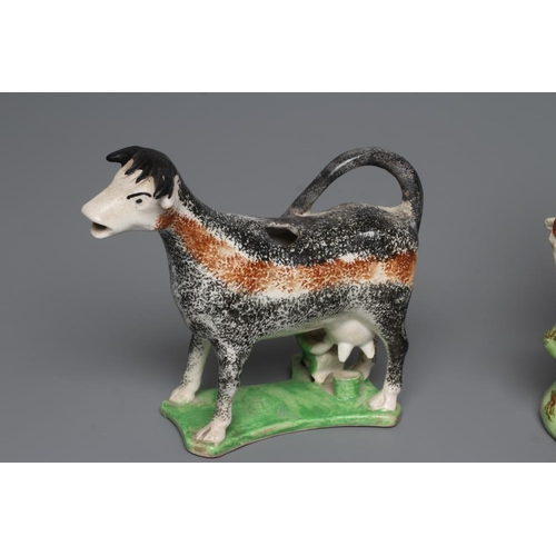 37 - A PAIR OF WALTON EARTHENWARE SPILL VASES, early 19th century, modelled as a ram and ewe both standin... 