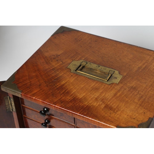 377 - A VICTORIAN WALNUT SPECIMEN TABLE CABINET of oblong form with brass campaign carrying handle and cor... 