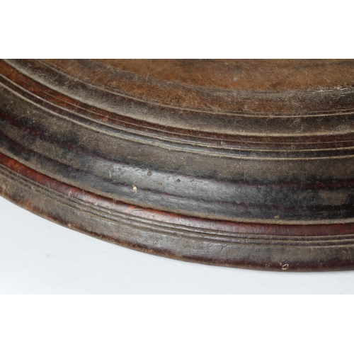 382 - A LARGE TURNED WOOD PLATTER of circular form, 23