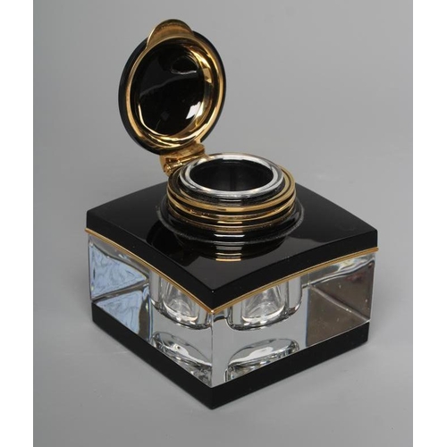 393 - A MONTBLANC MEISTERSTUCK SQUARE GLASS INKWELL, 1990's, with black plastic and gilt metal mounts, hin... 