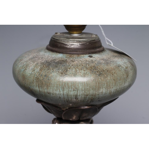 394 - AN ART NOUVEAU SILVERED SPELTER OIL LAMP, possibly French/Belgian, the streaky blue/brown glazed ear... 