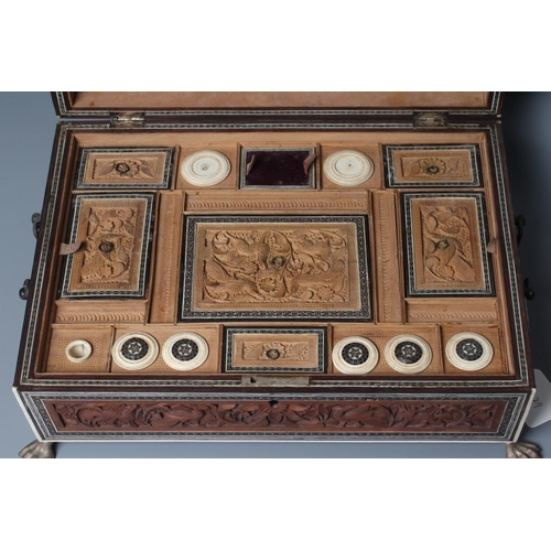 405 - AN ANGLO INDIAN SANDALWOOD SEWING BOX, mid 19th century, of sarcophagus form with Sadeli mosaic band... 