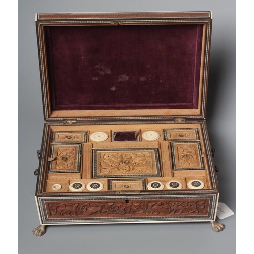 405 - AN ANGLO INDIAN SANDALWOOD SEWING BOX, mid 19th century, of sarcophagus form with Sadeli mosaic band... 