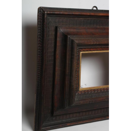 410 - A DUTCH RIPPLE MOULDED FRAME, 17th century, with gilded slip to take picture 12 3/4