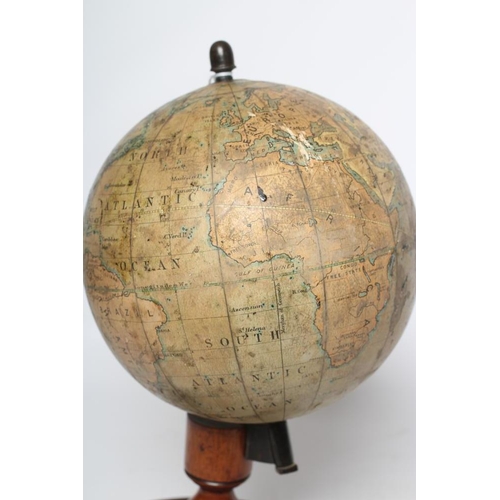 418 - A DESK TOP EDUCATIONAL TERRESTRIAL GLOBE by C Smith & Sons London, early 20th century, the mahogany ... 