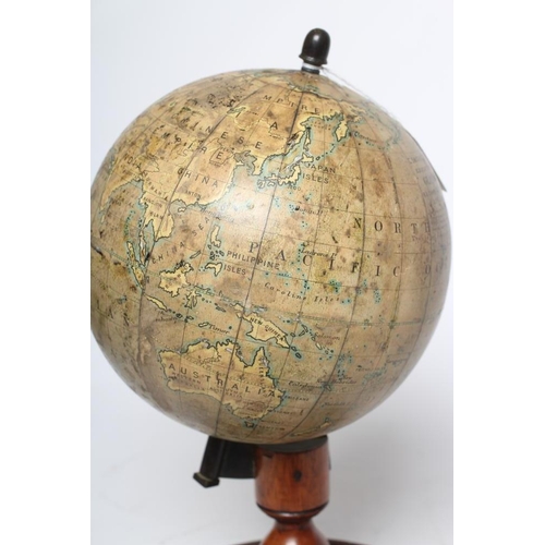 418 - A DESK TOP EDUCATIONAL TERRESTRIAL GLOBE by C Smith & Sons London, early 20th century, the mahogany ... 