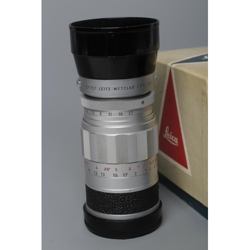 435 - A LEITZ WETZLAR ELMARIT LENS, 1:2.8/90, 1692527, together with a Leitz Visoflex II (2) (Est. plus 24... 