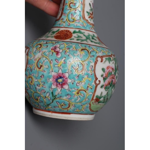 5 - A CHINESE PORCELAIN BOTTLE VASE painted in colours with panels of flowers, birds and butterflies on ... 