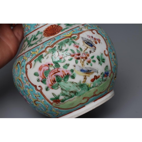 5 - A CHINESE PORCELAIN BOTTLE VASE painted in colours with panels of flowers, birds and butterflies on ... 