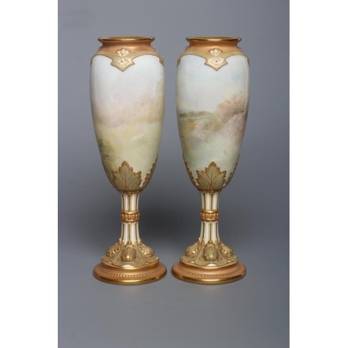 52 - A PAIR OF ROYAL DOULTON CHINA GARNITURE VASES, 1920's, of slender ovoid form raised upon cluster col... 