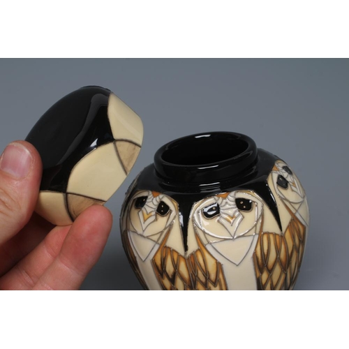 61 - A MOORCROFT POTTERY TENGU PATTERN SMALL GINGER JAR AND COVER, 2019, of ovoid form, tubelined and pai... 