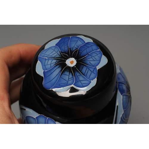 68 - A MOORCROFT POTTERY VANDA PATTERN SMALL GINGER JAR AND COVER, 2014, of ovoid form, tubelined and pai... 