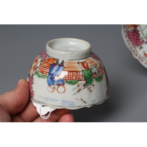 7 - A CHINESE PORCELAIN FAMILLE ROSE TEA BOWL AND SAUCER painted with a tightrope walker and a knife thr... 