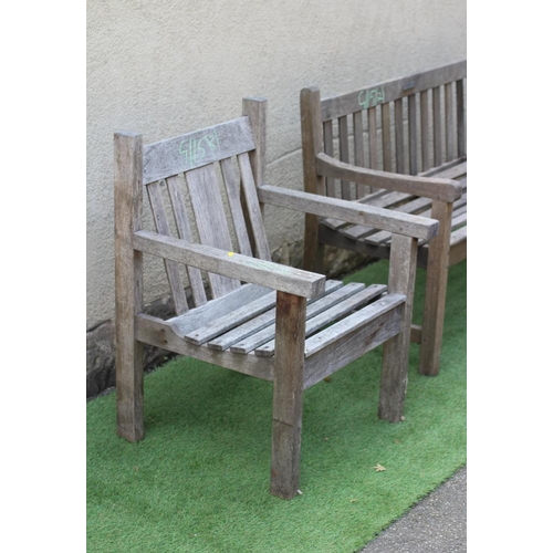 745 - A SLATTED TEAK BENCH with straight back and square section arm suppports and feet, 48